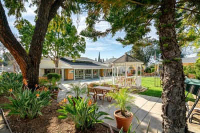 Outdoor garden with gazebo and seating area