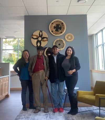 Residents and staff posing in a common area