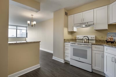 Bright and modern kitchen interior with granite countertops