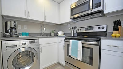 Modern kitchen with appliances and amenities