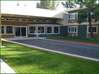 Exterior view of the Pinewood Glen Retirement Community building