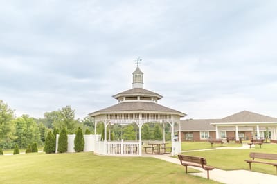 Outdoor gazebo in a landscaped area