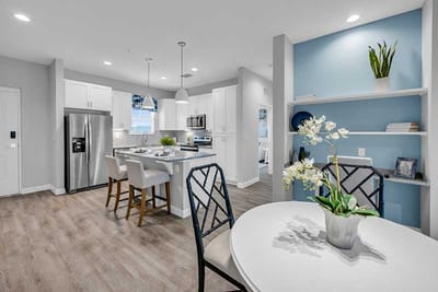 Modern kitchen and dining area in a senior living facility