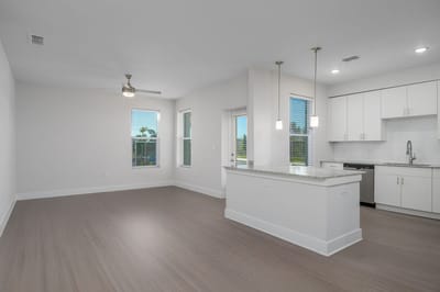 Bright, modern kitchen area in a senior living unit