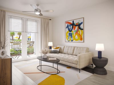 Bright and cozy interior living space with a sofa and art