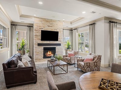 Common area with a fireplace and seating