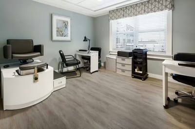 Beauty salon area with equipment and chairs