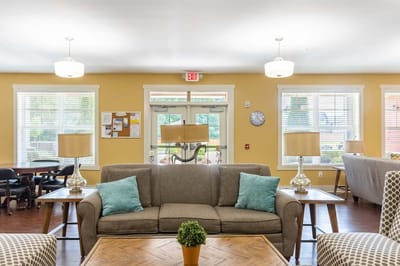 Cozy common area with seating and natural light