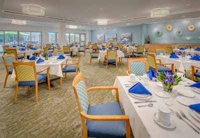 Dining room set up with tables and blue decor