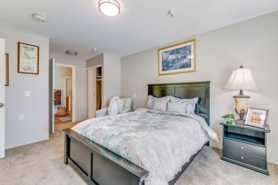 Cozy private resident room with a bed and decor
