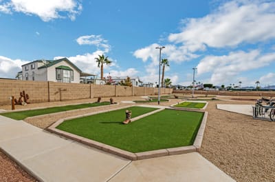 Outdoor lawn area with pathways and landscaping