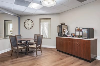 Interior common area with seating and refreshments