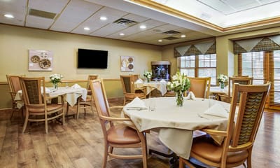 Dining area with tables and flowers