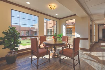 Bright common area with seating and natural light