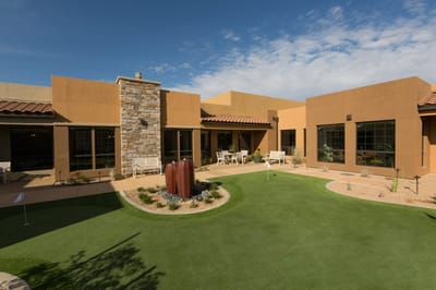 Outdoor courtyard with seating and landscaping