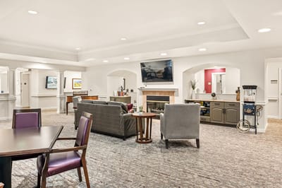 Common area with seating and a fireplace