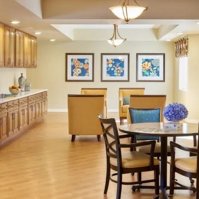 Bright common area with seating and artwork
