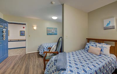 Bright, inviting private resident room with twin beds