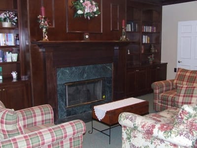 Common area with seating and a fireplace