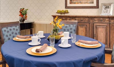 Dining table set up for a meal in the facility