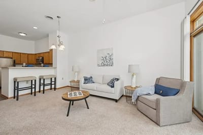 Bright and modern living room space with furniture