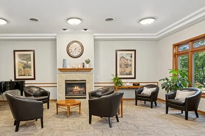 Cozy common area with comfortable seating and a fireplace