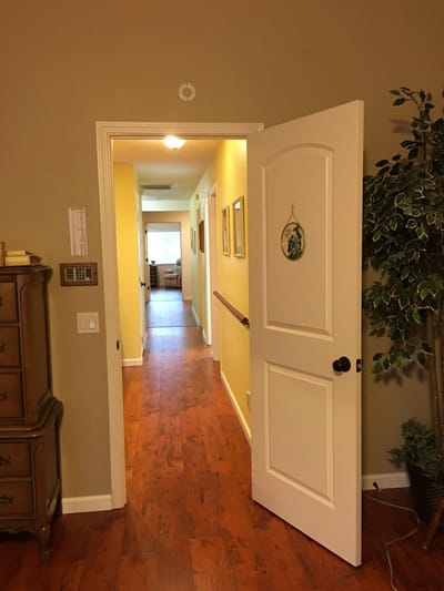 Interior hallway leading to resident rooms