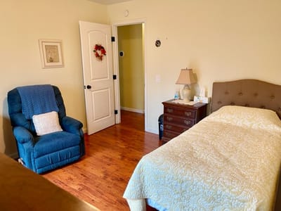 Cozy private bedroom in a senior living facility