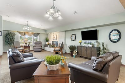 Bright common area with comfortable seating and natural light