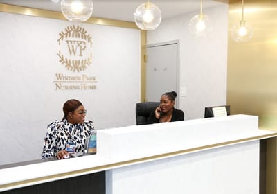 Staff at the reception desk of Windsor Park Nursing Home