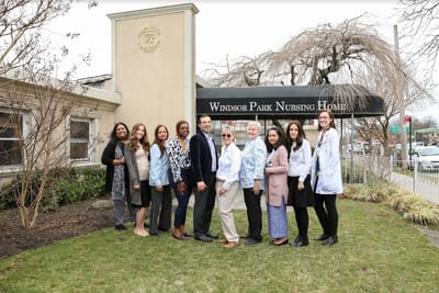 Staff members posing outside Windsor Park Nursing Home