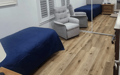 Interior view of a resident room with two beds
