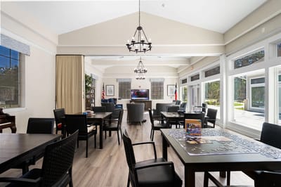 Bright common area with tables and chairs