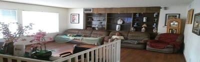 Interior of a common area with a resident relaxing