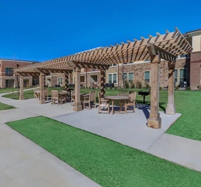 Covered outdoor seating area in a garden