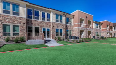 Exterior view of Lavon Senior Villas with landscaped area