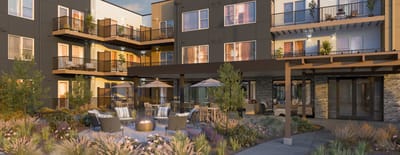Outdoor patio area with seating and fire pit