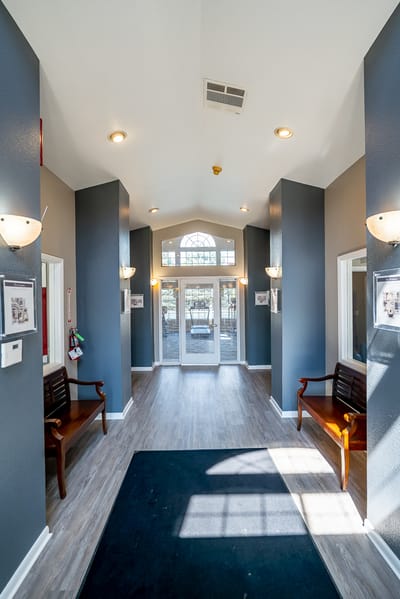 Interior view of a welcoming hallway with seating