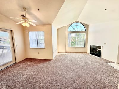 Bright interior view of a resident room with large windows