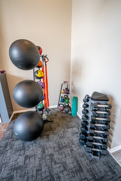 Fitness area with gym equipment and weights