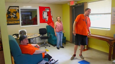 Residents interacting in a vibrant activity room