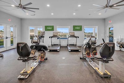 Interior view of a fitness room with exercise equipment