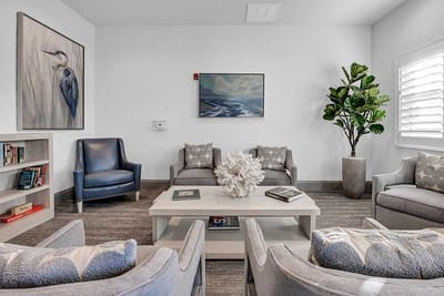Interior view of a cozy common area with seating