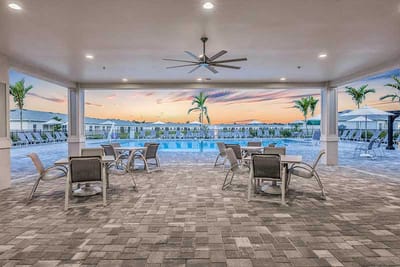 Outdoor amenity area with pool and seating