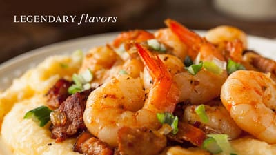 Shrimp dish served on a plate with garnishes