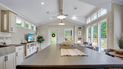 Bright common area with modern decor and large windows