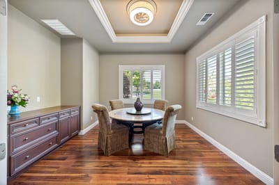 Elegant dining area with a round table and chairs