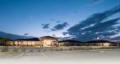 Exterior view of Kern River Transitional Care at dusk