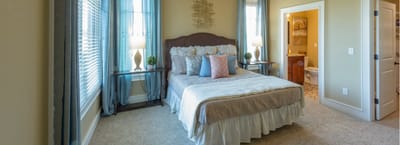 Cozy private bedroom with natural light