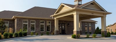 Exterior view of Village on the Park Bentonville facility